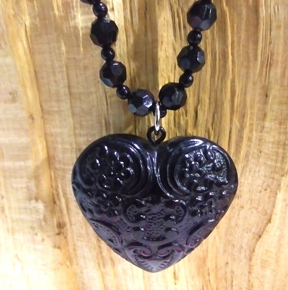 Long necklace with heart pendant